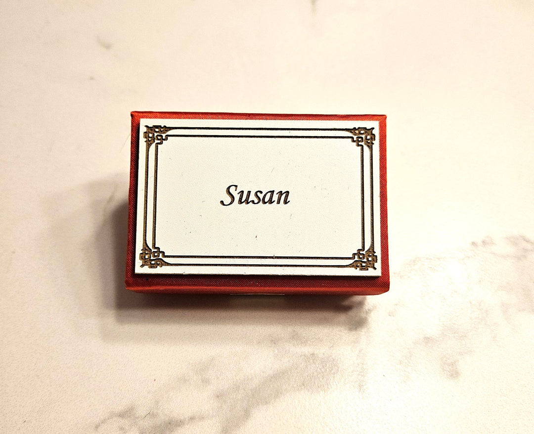 Choose the name of your choice to personalize this trinket. You can request for your favorite font too.